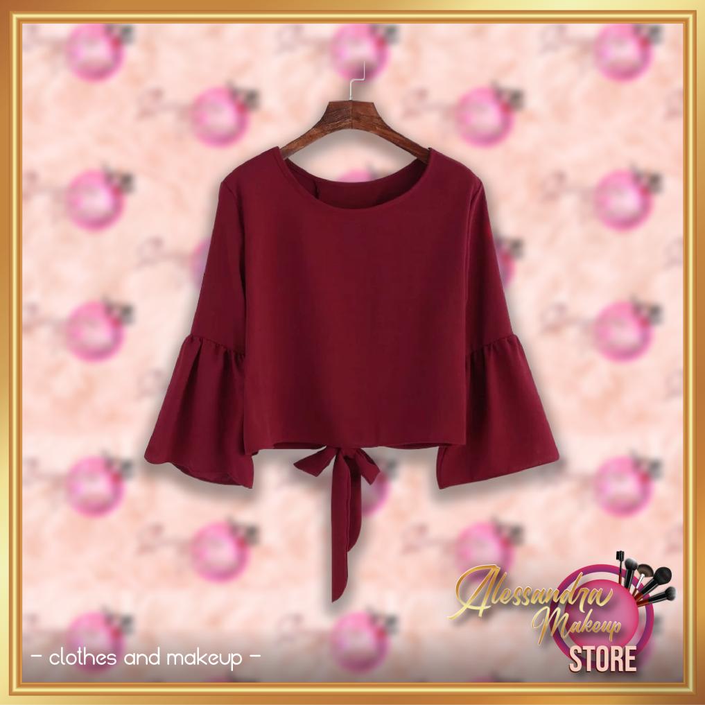 Blusa con mangas acampanadas